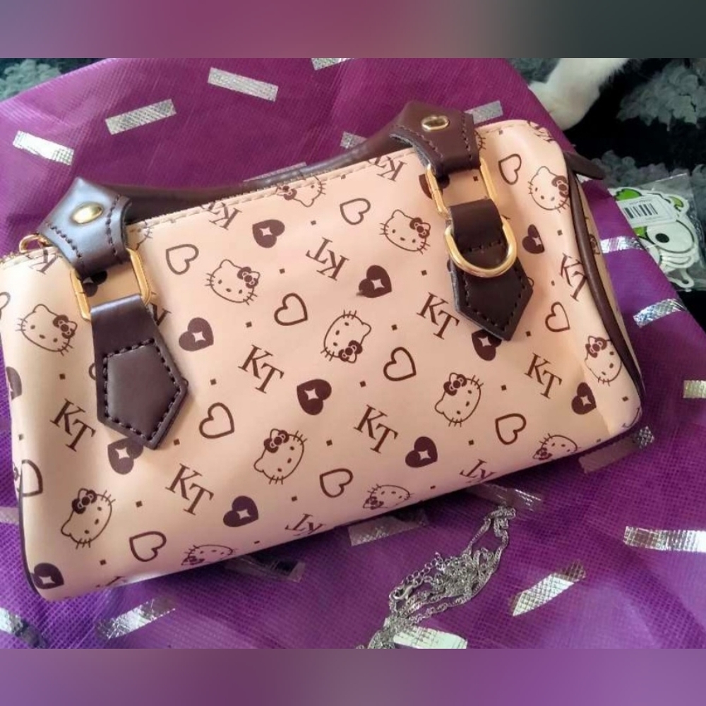 New Hello Kitty Purse With Cross Body Straps. Other Items Sold Seperately